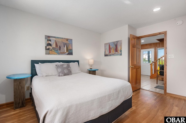 42082 Ocean View Dr Lot 67, Avon, NC 27915 - bedroom featuring light wood-style floors, baseboards, and recessed lighting