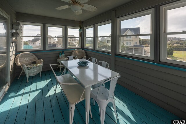 1024 Lighthouse Dr Lot 14, Corolla, NC 27927 - sunroom featuring ceiling fan, healthy amount of natural light, and outdoor dining space