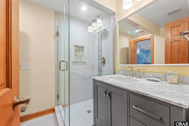1024 Lighthouse Dr Lot 14, Corolla, NC 27927 - bathroom with vanity, a stall shower, and tile patterned flooring