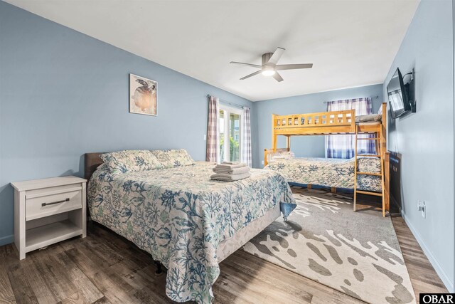 1024 Lighthouse Dr Lot 14, Corolla, NC 27927 - bedroom with wood finished floors and a ceiling fan