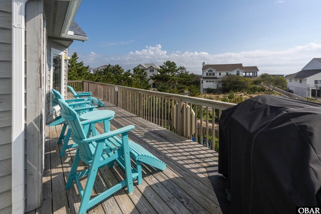 1024 Lighthouse Dr Lot 14, Corolla, NC 27927 - wooden deck featuring a grill and a residential view