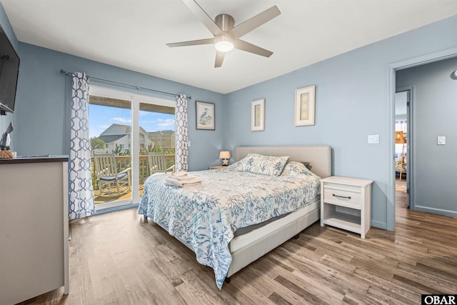 1024 Lighthouse Dr Lot 14, Corolla, NC 27927 - bedroom featuring wood finished floors, access to outside, and ceiling fan