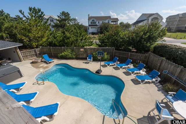 1024 Lighthouse Dr Lot 14, Corolla, NC 27927 - view of pool featuring a patio area, a fenced backyard, and a residential view