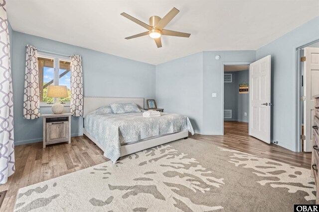 1024 Lighthouse Dr Lot 14, Corolla, NC 27927 - bedroom with wood finished floors and a ceiling fan
