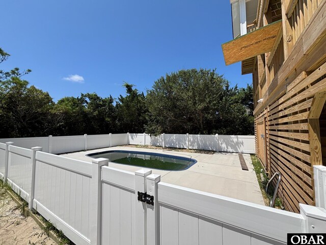 26210 Merrimac Ln Lot 46, Salvo, NC 27972 - view of swimming pool featuring a fenced backyard