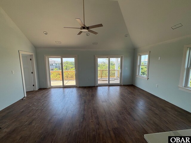 26210 Merrimac Ln Lot 46, Salvo, NC 27972 - empty room with ceiling fan, dark wood-style flooring, and high vaulted ceiling