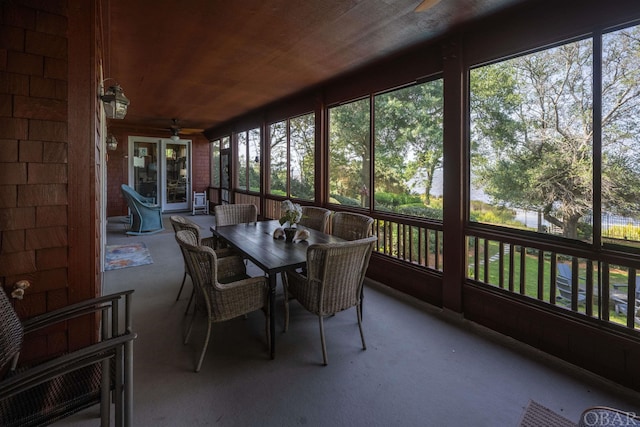 sunroom with wooden ceiling