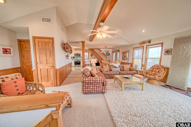 58208 Sand Rd Lot 19, Hatteras, NC 27943 - carpeted living room with lofted ceiling, a wainscoted wall, ornate columns, and a ceiling fan