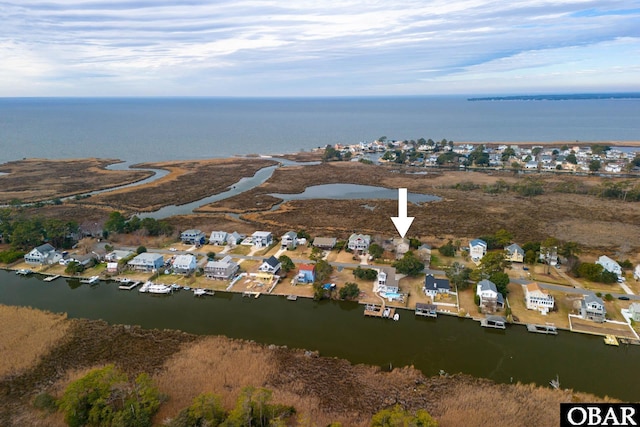 aerial view with a residential view and a water view