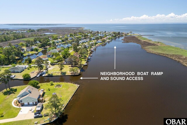 aerial view with a water view and a residential view