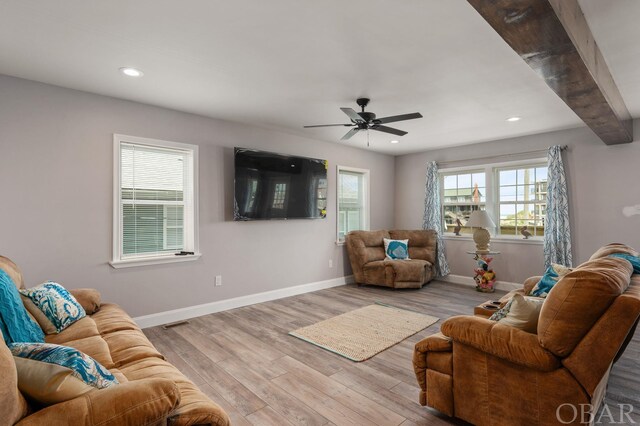 living area with recessed lighting, wood finished floors, a ceiling fan, visible vents, and baseboards