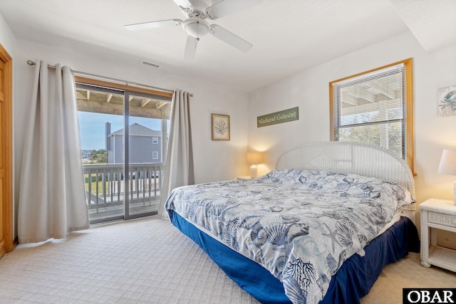 754 Cormorant Trl Lot 79, Corolla, NC 27927 - carpeted bedroom featuring access to exterior and ceiling fan
