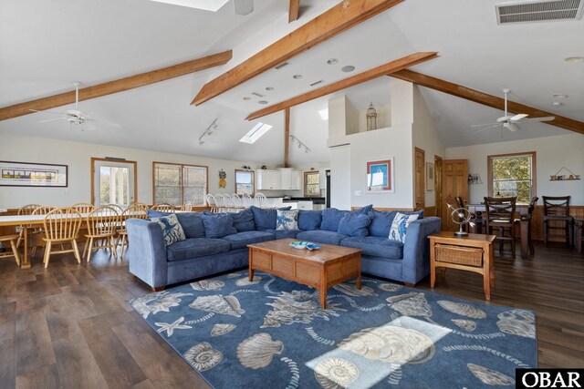 754 Cormorant Trl Lot 79, Corolla, NC 27927 - living room with a ceiling fan, beamed ceiling, dark wood-style flooring, and high vaulted ceiling