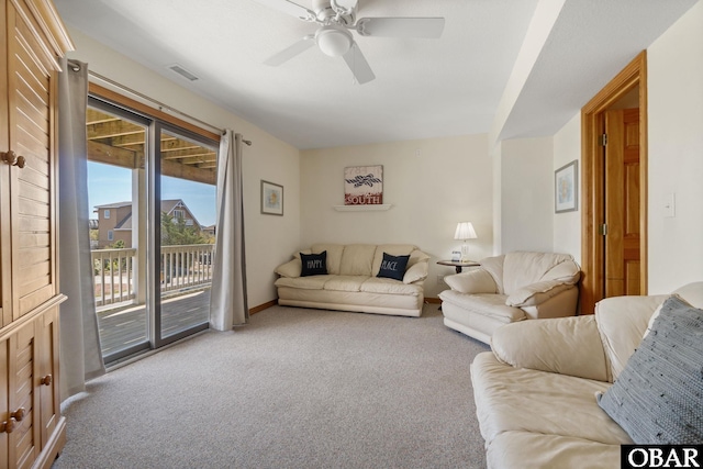 754 Cormorant Trl Lot 79, Corolla, NC 27927 - carpeted living area featuring a ceiling fan and baseboards