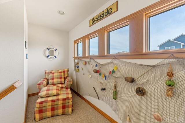 carpeted bedroom with baseboards