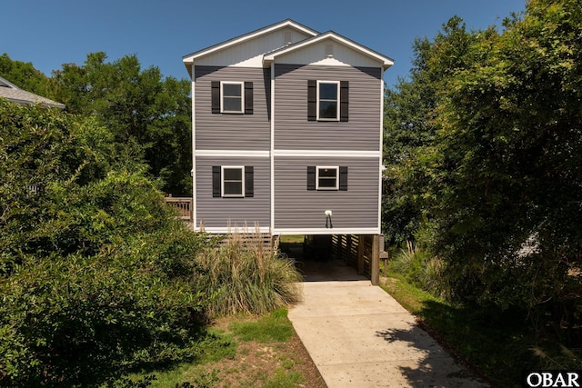 102 Prince Charles Ct Lot 47, Kill Devil Hills, NC 27948 - view of side of property featuring driveway and a carport