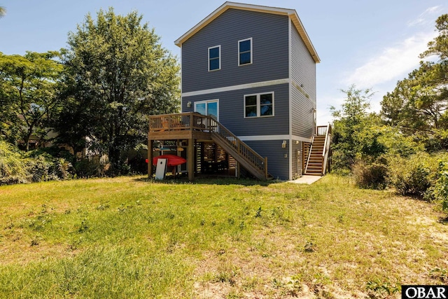 102 Prince Charles Ct Lot 47, Kill Devil Hills, NC 27948 - back of property featuring stairs, a yard, and a deck
