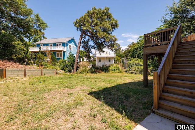 102 Prince Charles Ct Lot 47, Kill Devil Hills, NC 27948 - view of green lawn with stairs and a deck