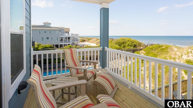 909 Lighthouse Dr Lot # 8, Corolla, NC 27927 - balcony featuring a water view