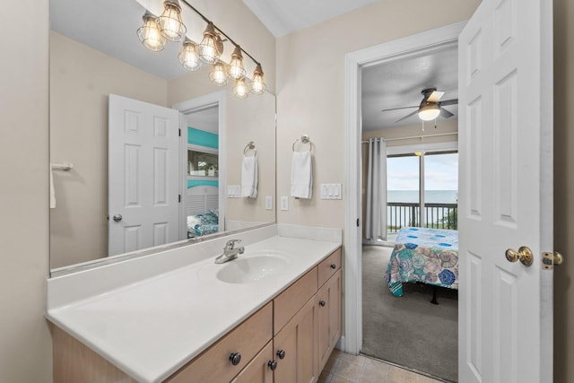 1386B Duck Rd Lot 34, Duck, NC 27949 - bathroom with a water view, a ceiling fan, vanity, and connected bathroom