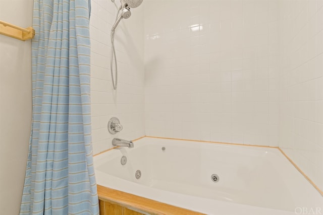 full bathroom with a combined bath / shower with jetted tub