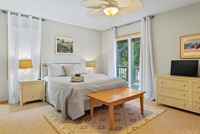 bedroom with access to exterior, light carpet, ceiling fan, and a textured ceiling