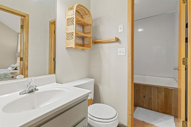 full bath with vanity and toilet