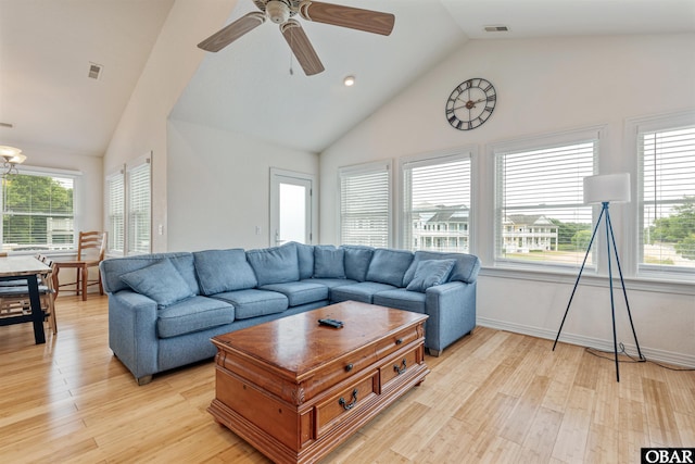 759 Ridge Point Dr Lot 42, Corolla, NC 27927 - living room featuring light wood finished floors, ceiling fan, high vaulted ceiling, and baseboards
