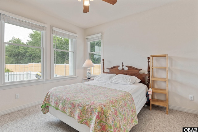 759 Ridge Point Dr Lot 42, Corolla, NC 27927 - carpeted bedroom featuring baseboards and ceiling fan