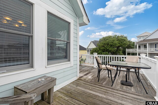 759 Ridge Point Dr Lot 42, Corolla, NC 27927 - wooden deck with outdoor dining area