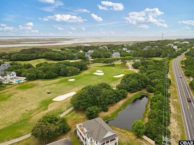759 Ridge Point Dr Lot 42, Corolla, NC 27927 - drone / aerial view of a large body of water, a golf course, and a tree filled landscape