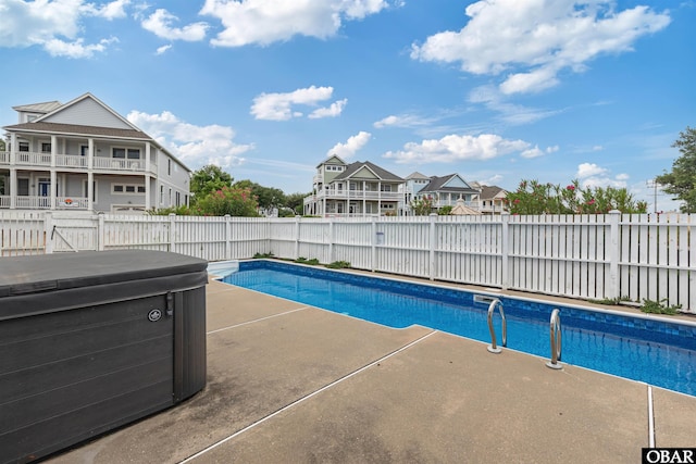 759 Ridge Point Dr Lot 42, Corolla, NC 27927 - view of swimming pool with a hot tub, a fenced backyard, and a patio area