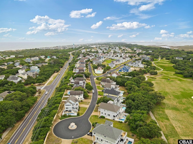 759 Ridge Point Dr Lot 42, Corolla, NC 27927 - aerial view of property's location with nearby suburban area and a tree filled landscape