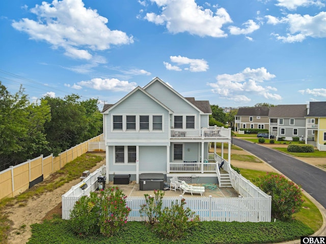 759 Ridge Point Dr Lot 42, Corolla, NC 27927 - rear view of house with a fenced backyard, a balcony, and a patio area