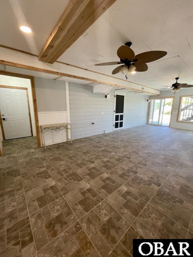 25273 Sea Isle Hills Dr Lot 5-2, Waves, NC 27982 - empty room featuring a ceiling fan and wooden walls