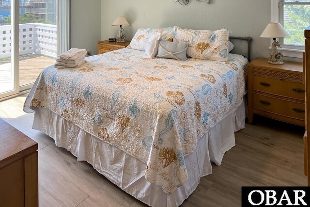 25273 Sea Isle Hills Dr Lot 5-2, Waves, NC 27982 - bedroom featuring wood finished floors and access to outside