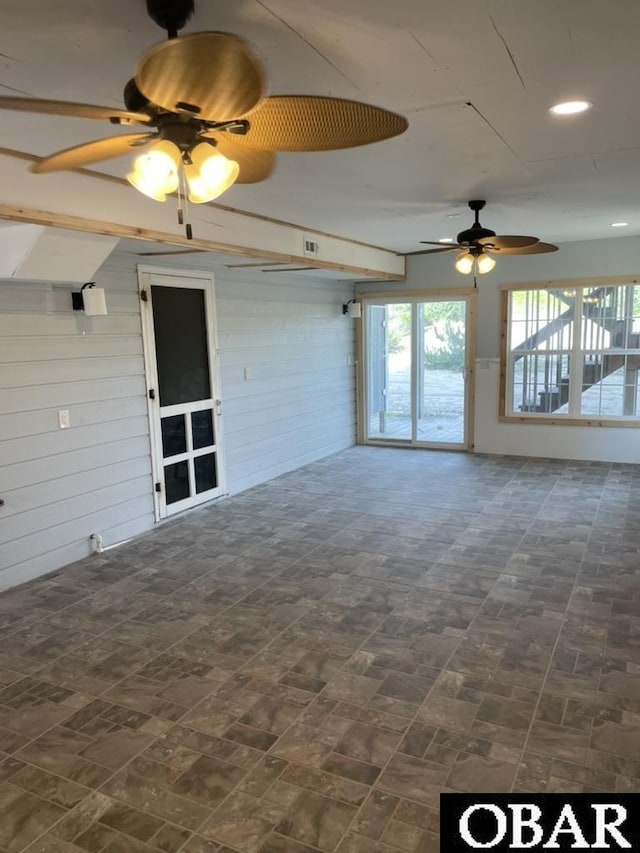 25273 Sea Isle Hills Dr Lot 5-2, Waves, NC 27982 - spare room featuring a ceiling fan, brick patterned floors, wooden walls, and recessed lighting