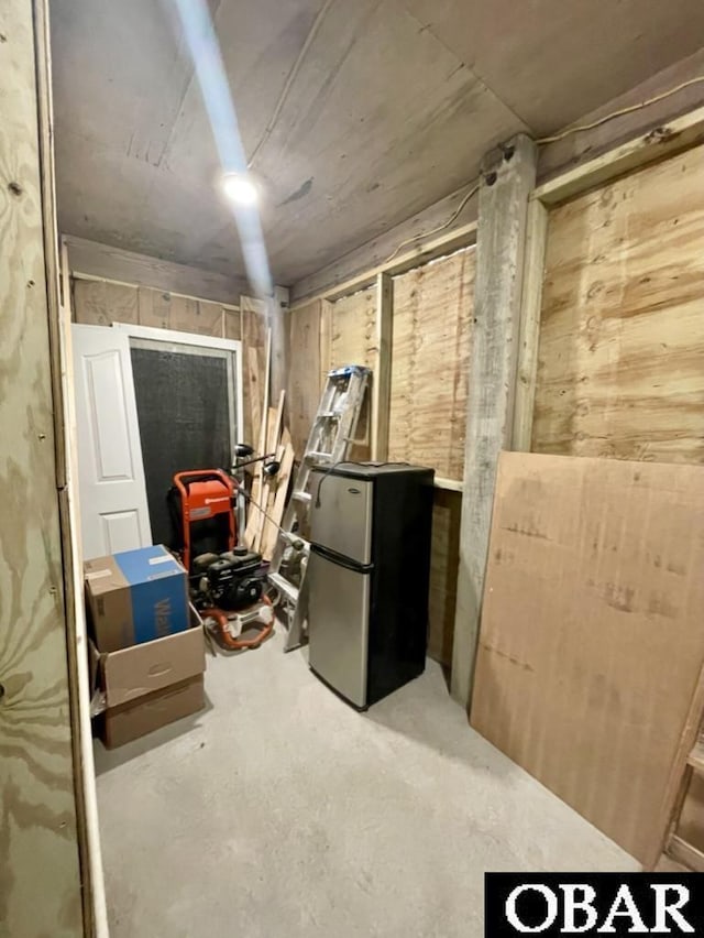25273 Sea Isle Hills Dr Lot 5-2, Waves, NC 27982 - unfinished basement with freestanding refrigerator