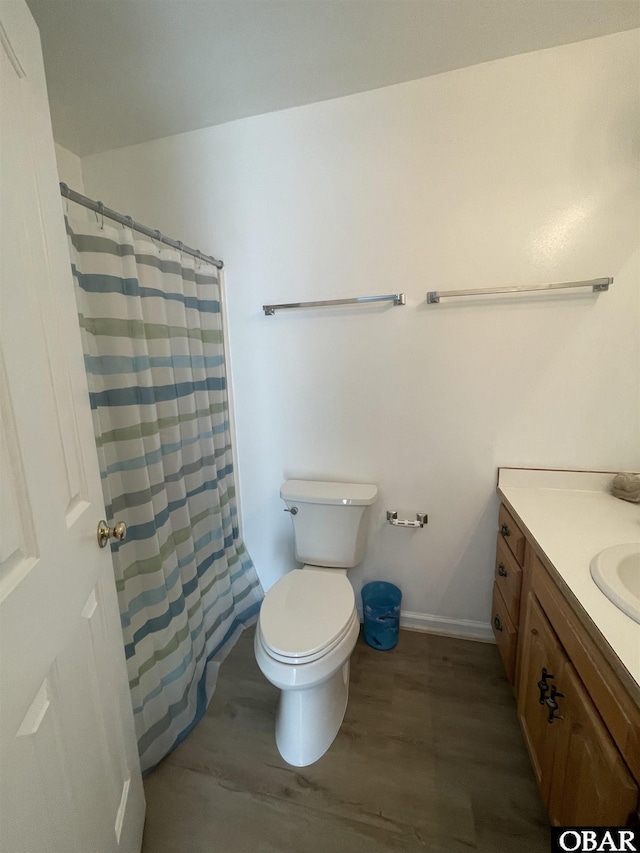 25273 Sea Isle Hills Dr Lot 5-2, Waves, NC 27982 - bathroom featuring wood finished floors, vanity, toilet, baseboards, and curtained shower