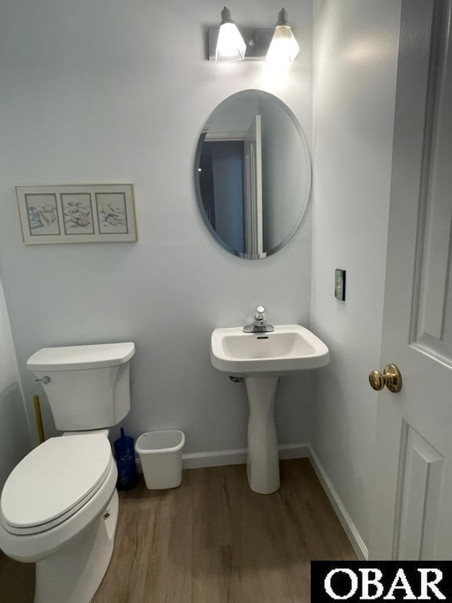 25273 Sea Isle Hills Dr Lot 5-2, Waves, NC 27982 - bathroom featuring wood finished floors, toilet, and baseboards