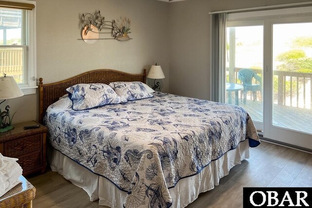 25273 Sea Isle Hills Dr Lot 5-2, Waves, NC 27982 - bedroom featuring wood finished floors and access to outside