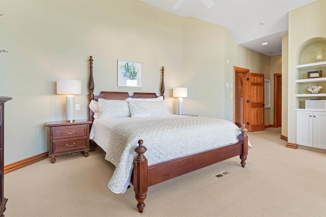 bedroom featuring baseboards, a ceiling fan, and light colored carpet