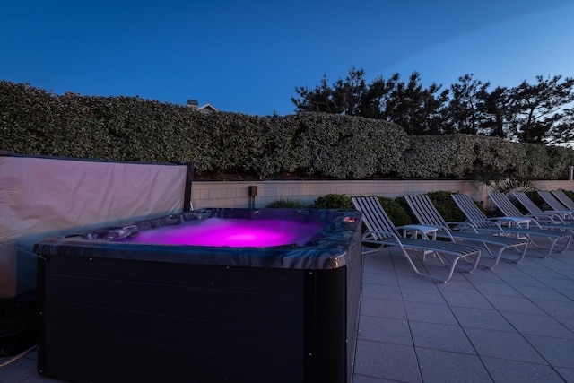 view of patio with a hot tub