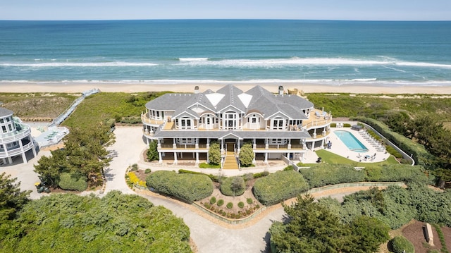 aerial view with a view of the beach and a water view