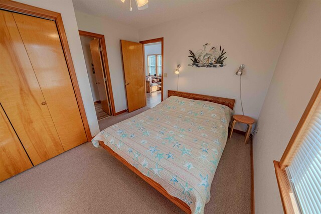 40270 Croaker Ct Lot D, Avon, NC 27915 - bedroom featuring carpet flooring, a closet, baseboards, and ceiling fan