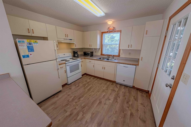 40270 Croaker Ct Lot D, Avon, NC 27915 - kitchen featuring white appliances, a sink, under cabinet range hood, a textured ceiling, and light wood finished floors
