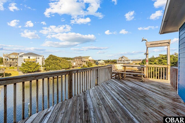 50096 Freebooter Ct Lot 178, Frisco, NC 27936 - wooden deck featuring a residential view and a water view