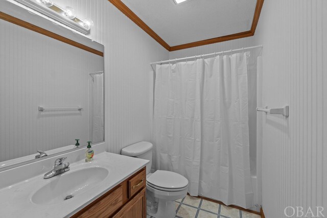 50096 Freebooter Ct Lot 178, Frisco, NC 27936 - bathroom with toilet, a shower with curtain, tile patterned flooring, crown molding, and vanity