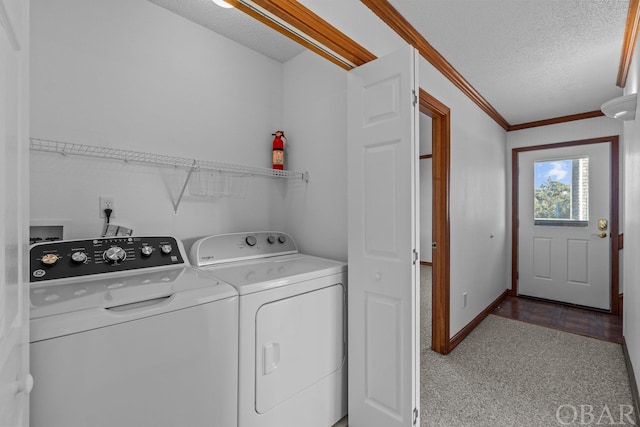 50096 Freebooter Ct Lot 178, Frisco, NC 27936 - washroom with washer and clothes dryer, ornamental molding, a textured ceiling, laundry area, and baseboards