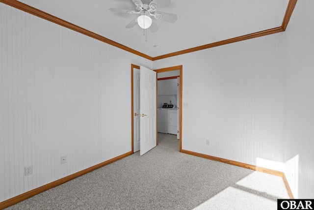 50096 Freebooter Ct Lot 178, Frisco, NC 27936 - unfurnished room with light carpet, baseboards, ceiling fan, independent washer and dryer, and crown molding